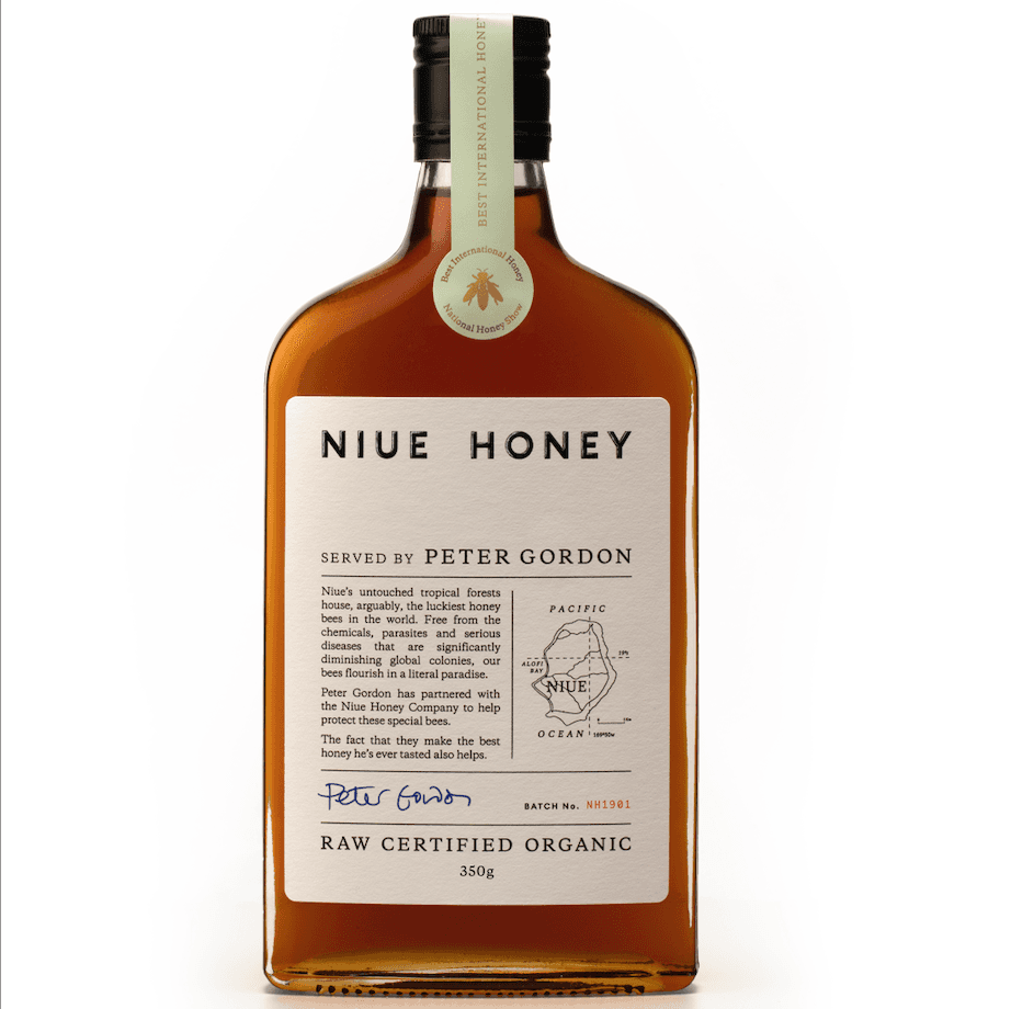 Bottle of Niue Honey served by Peter Gordon on a white background