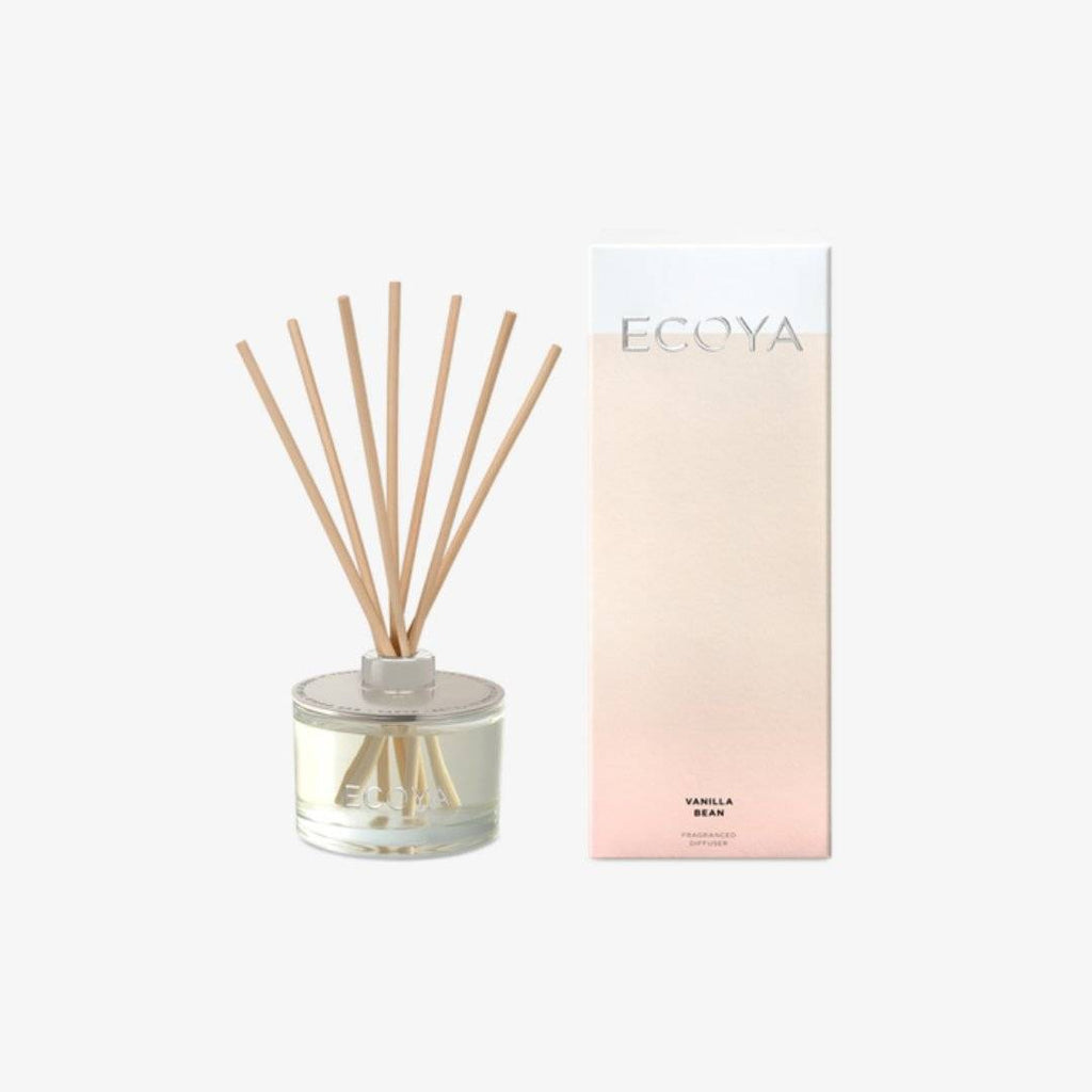Ecoya Reed Diffuser - Vanilla Bean Tonka 200ml in a clear glass jar with natural reeds, shown beside its blush and beige gift box packaging.